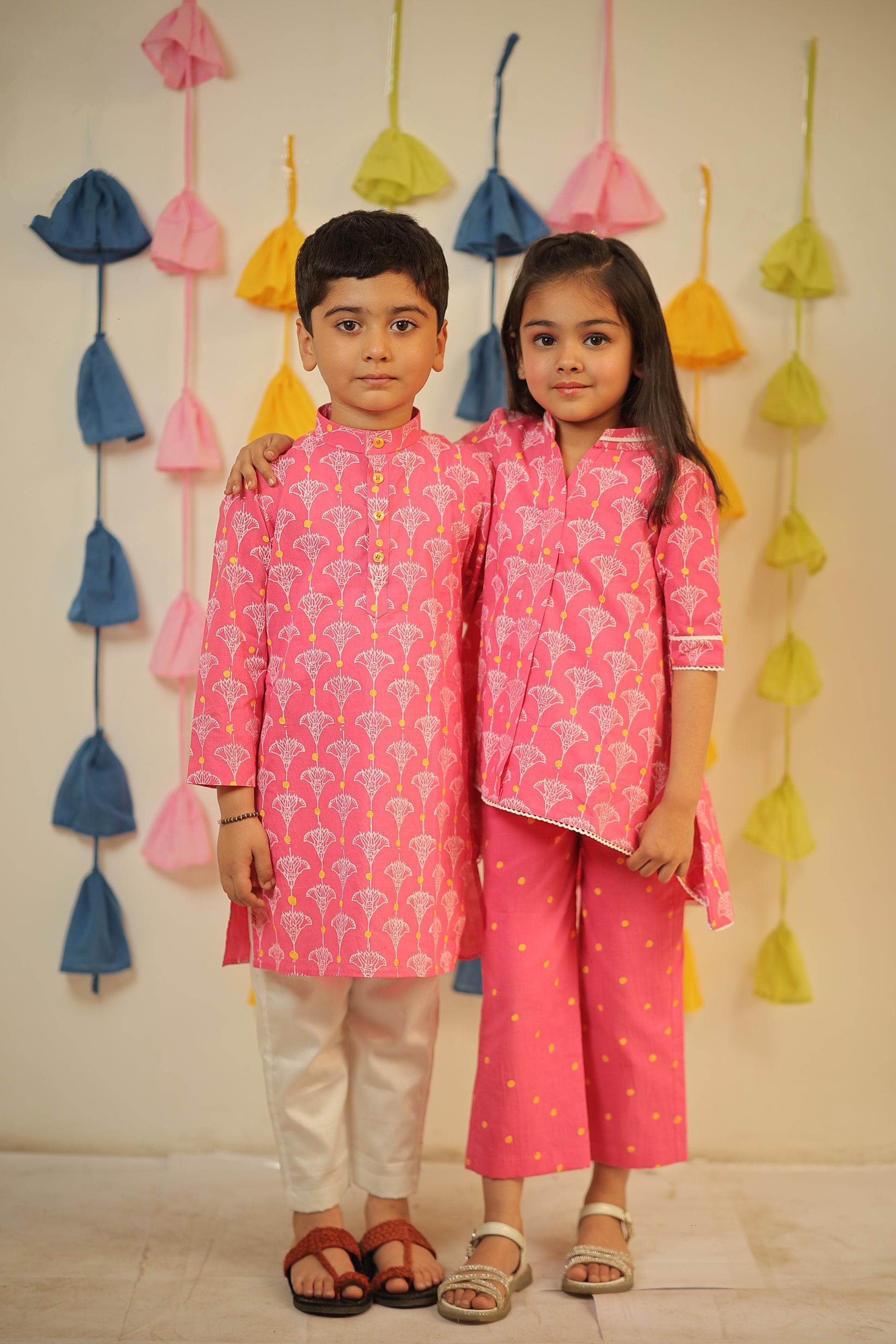 Pink block printed high-low kurta set.