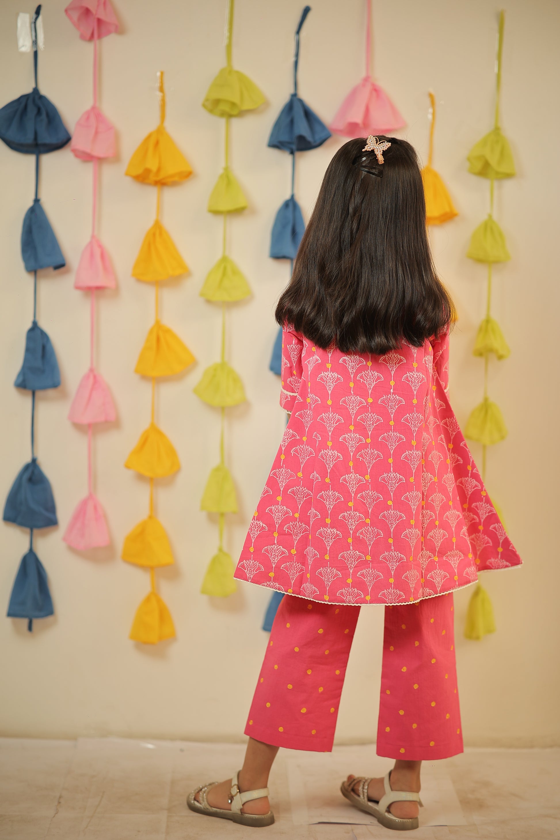 Pink block printed high-low kurta set.