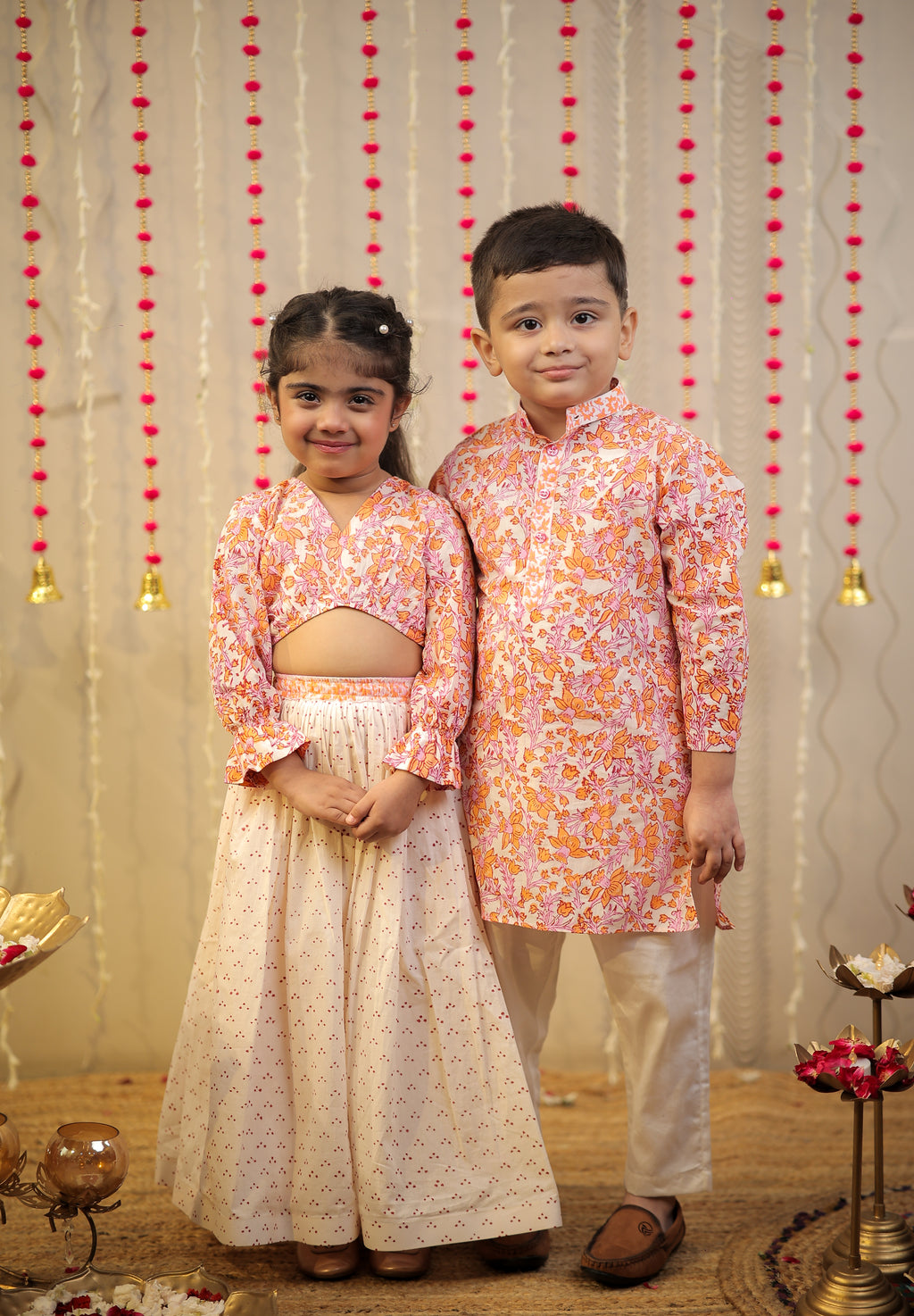 Peach orange block printed kurta set.