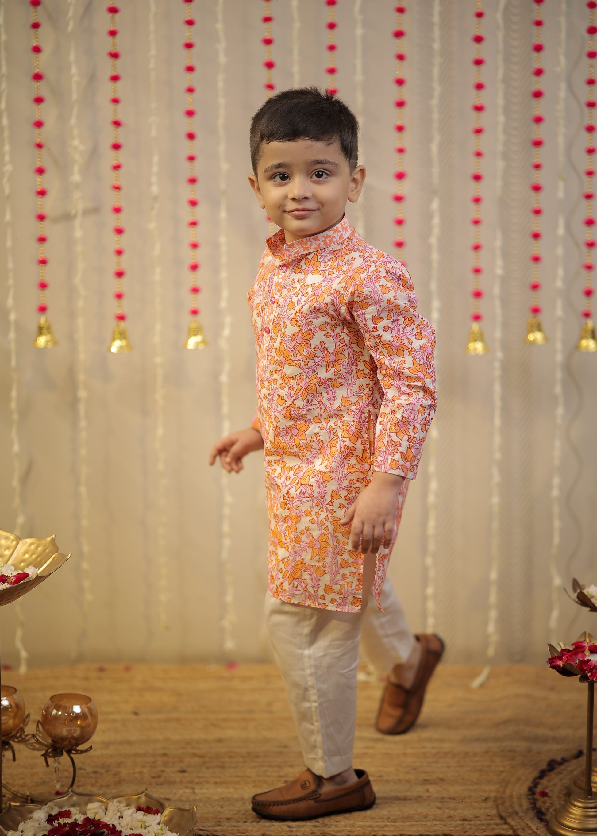Peach orange block printed kurta set.