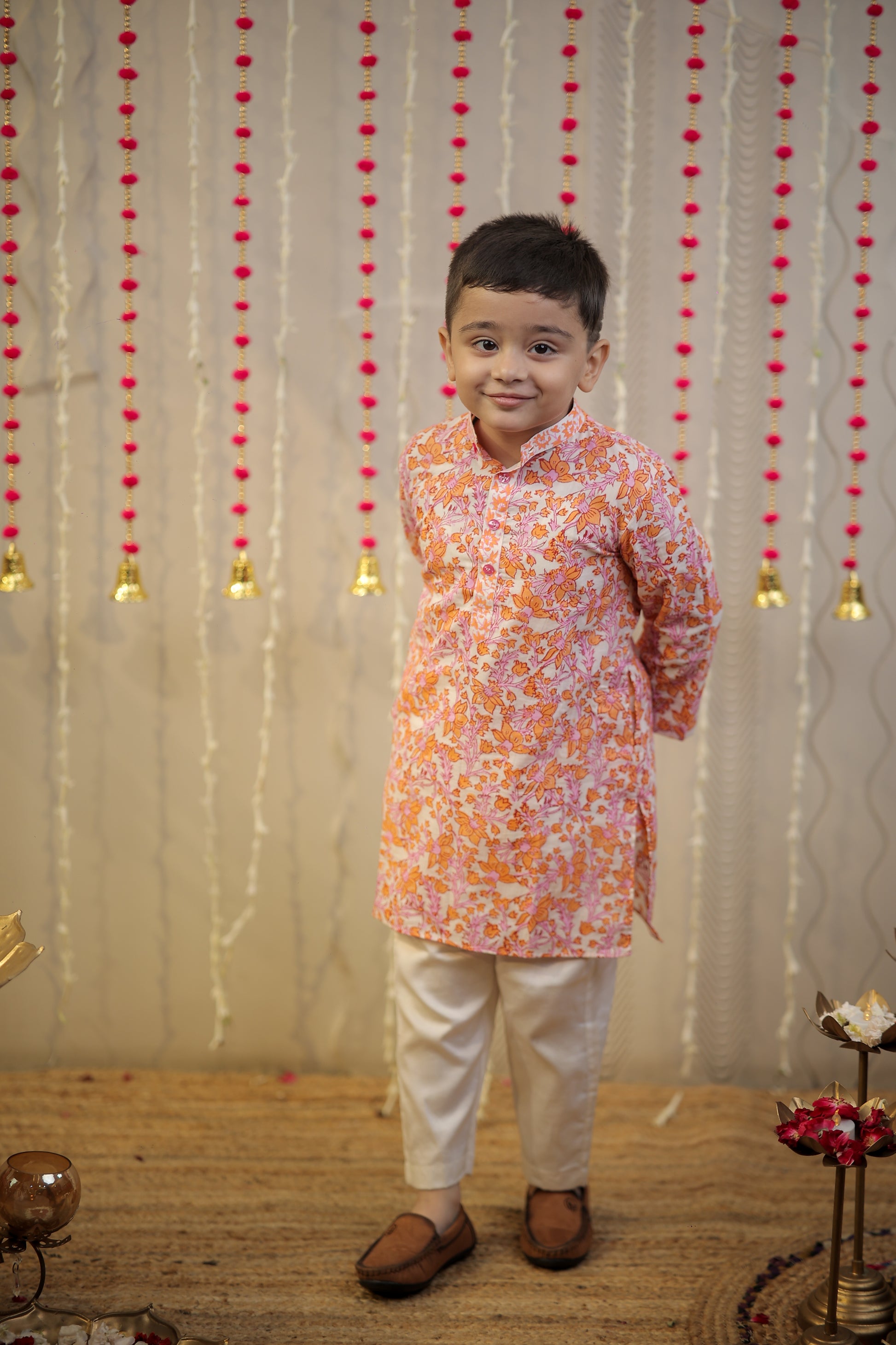 Peach orange block printed kurta set.