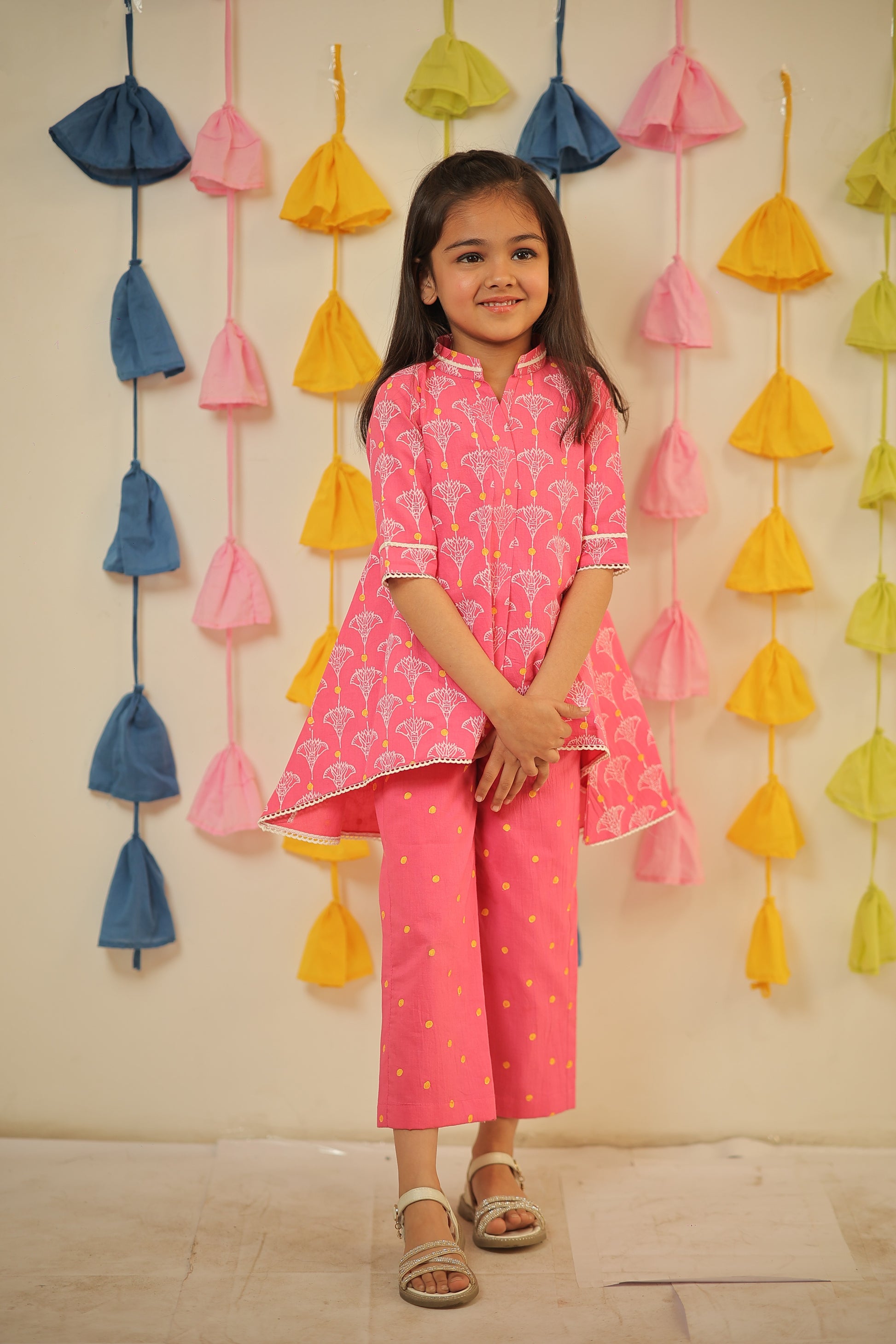 Pink block printed high-low kurta set.
