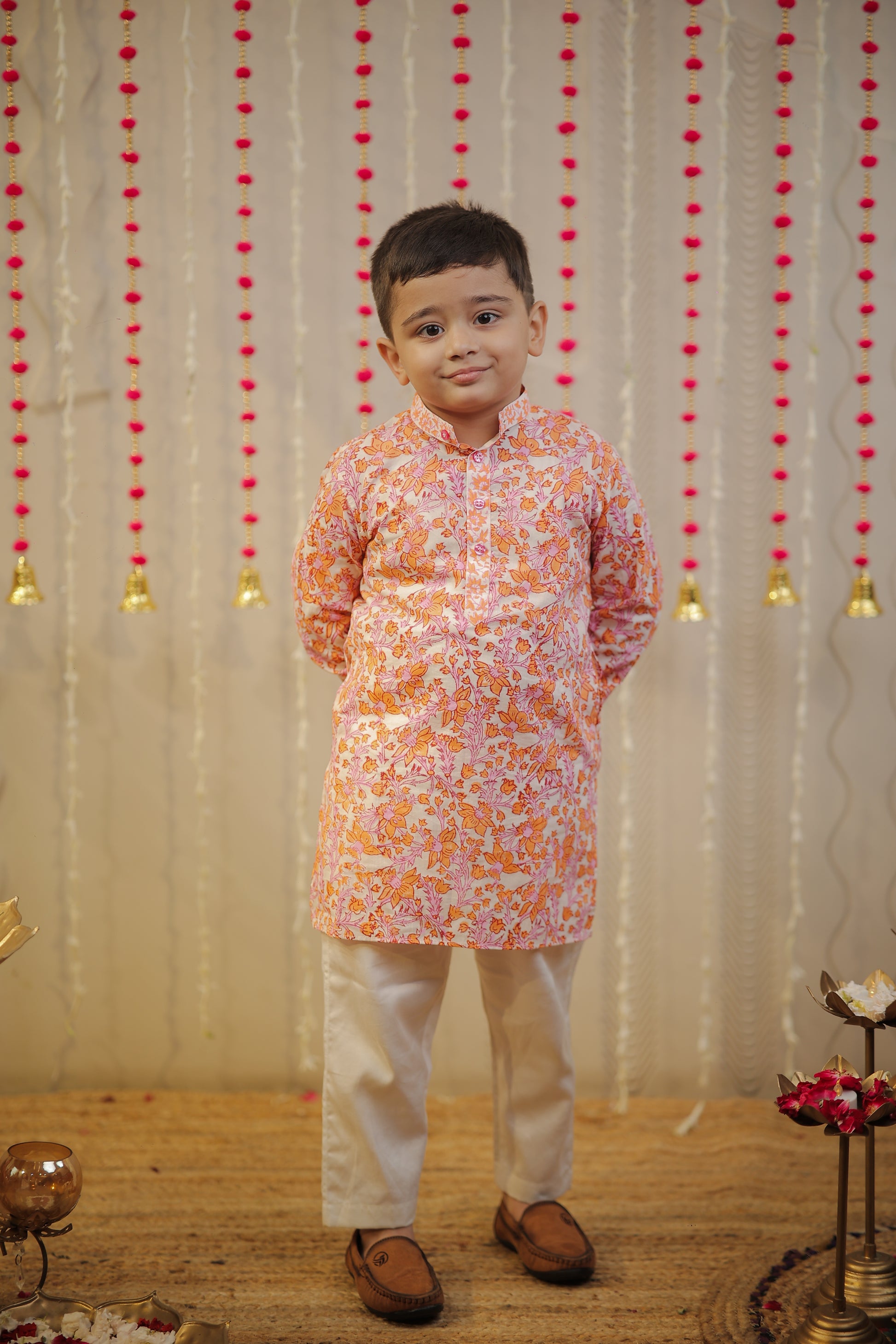 Peach orange block printed kurta set.