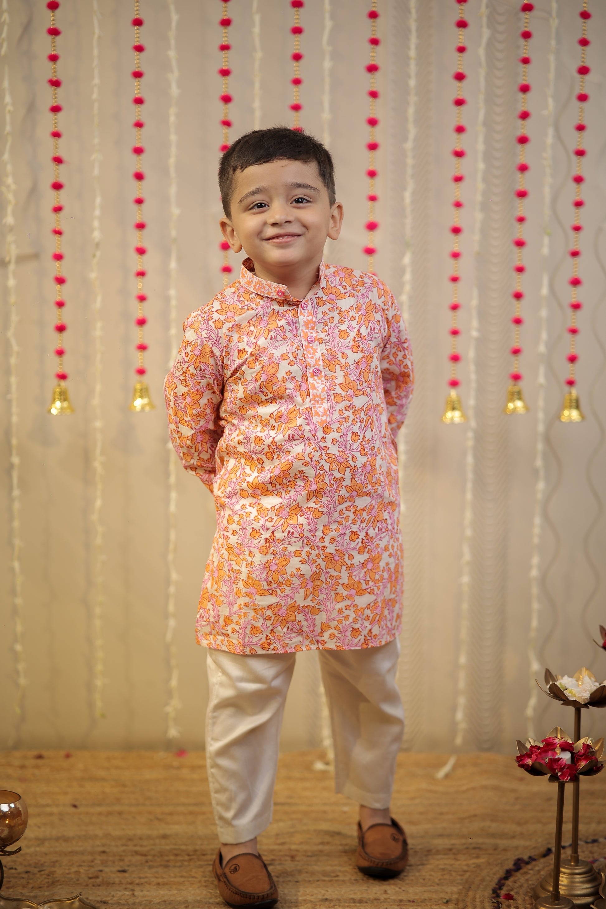 Peach orange block printed kurta set.