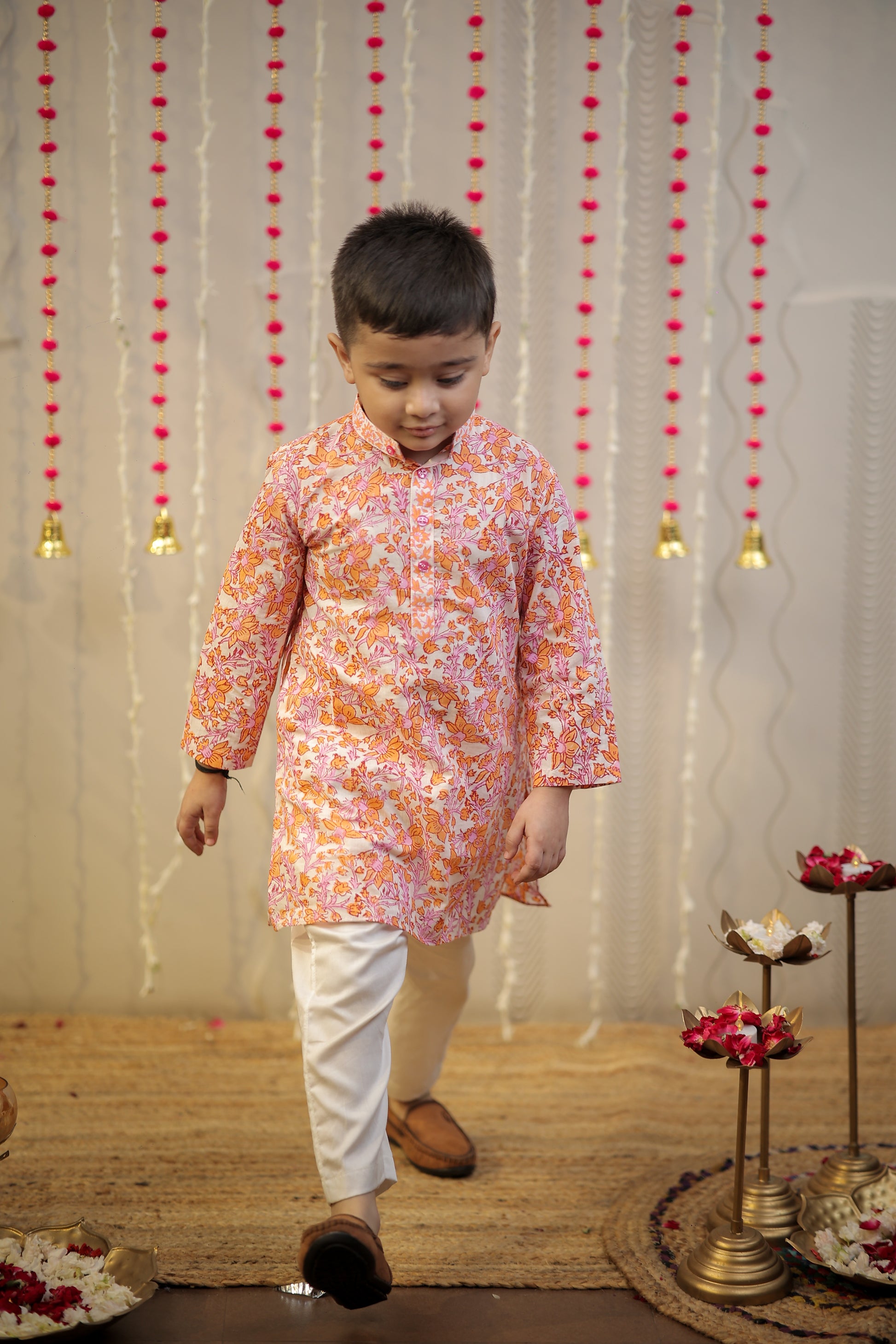 Peach orange block printed kurta set.