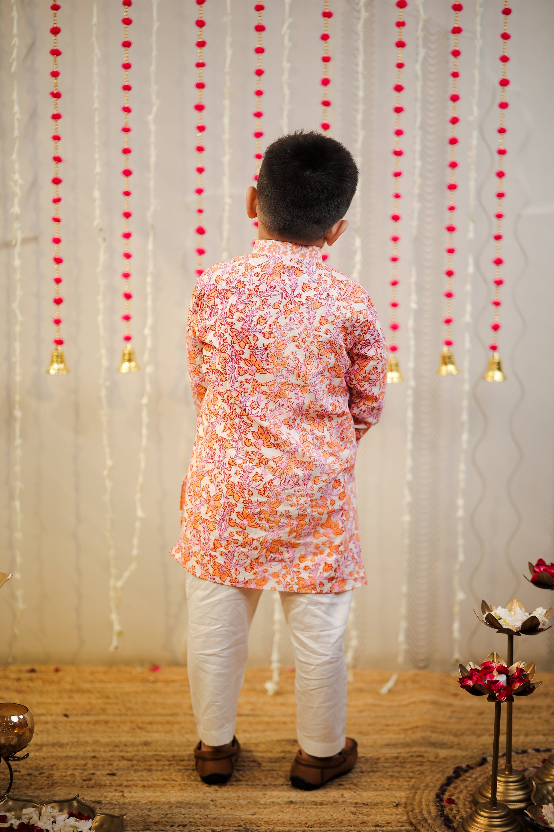 Peach orange block printed kurta set.