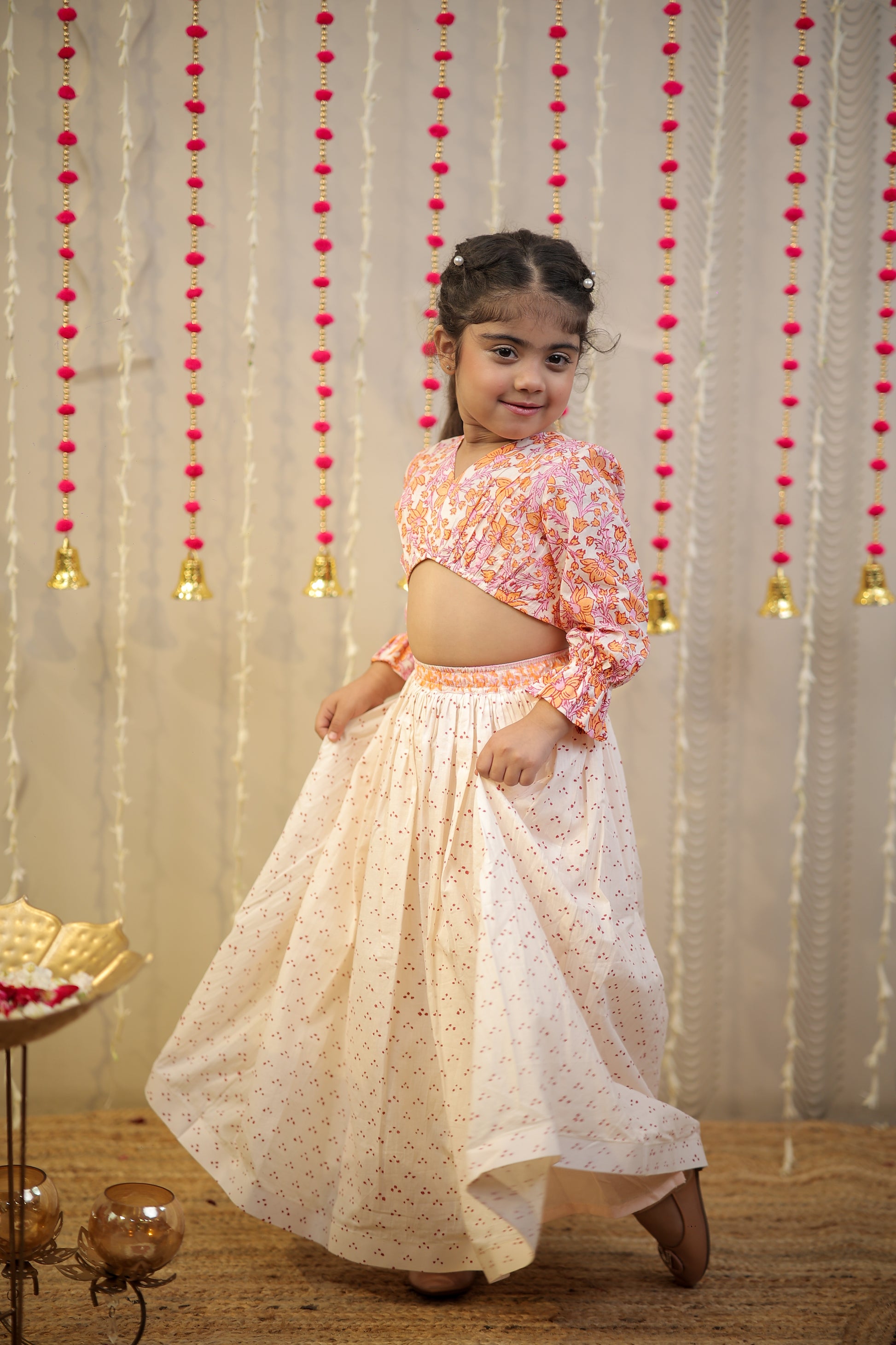 Peach orange block printed crop top with skirt.