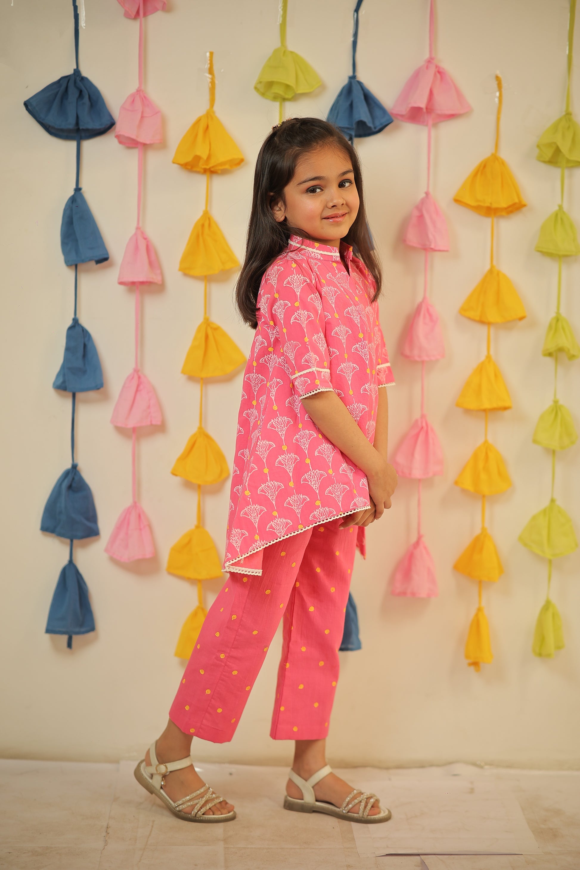 Pink block printed high-low kurta set.