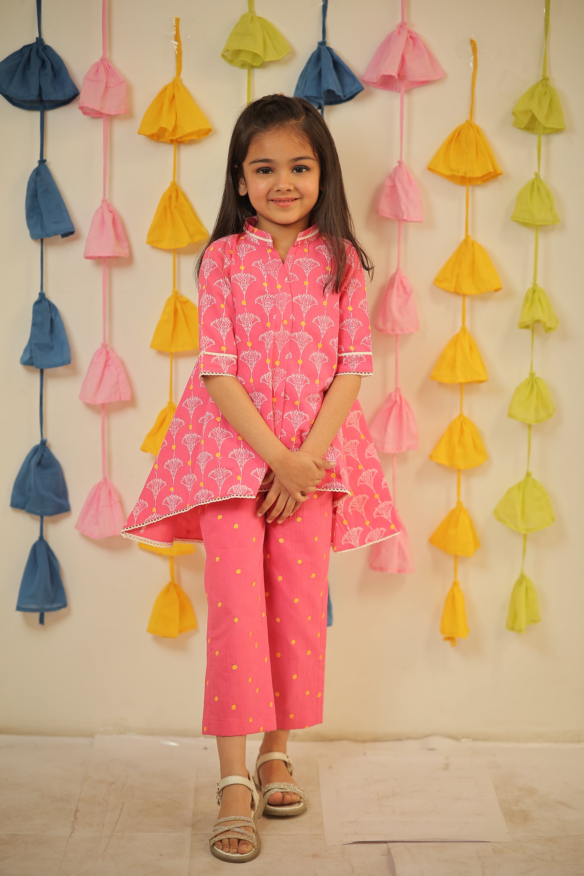 Pink block printed high-low kurta set.